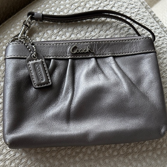Coach Handbags - Coach Metallic Gray Leather Wristlet